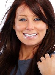 woman smiling after receiving a bridge